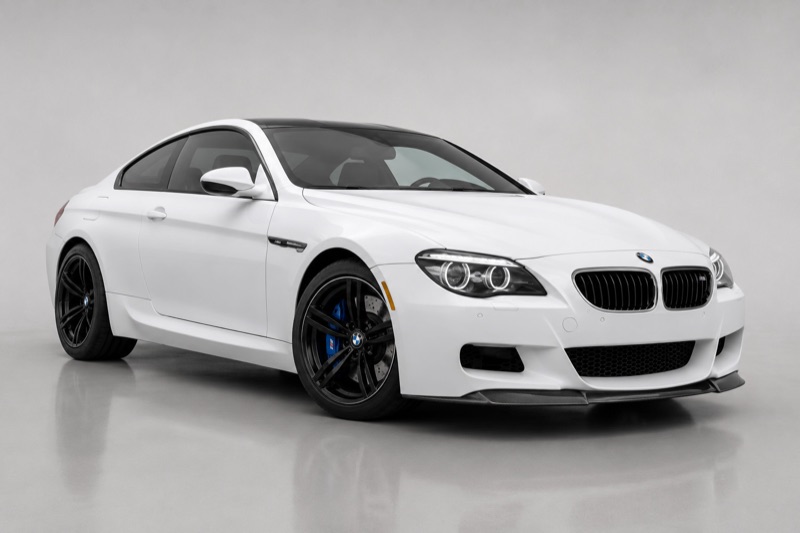 BMW M6 Coupé in white — front three-quarter studio view